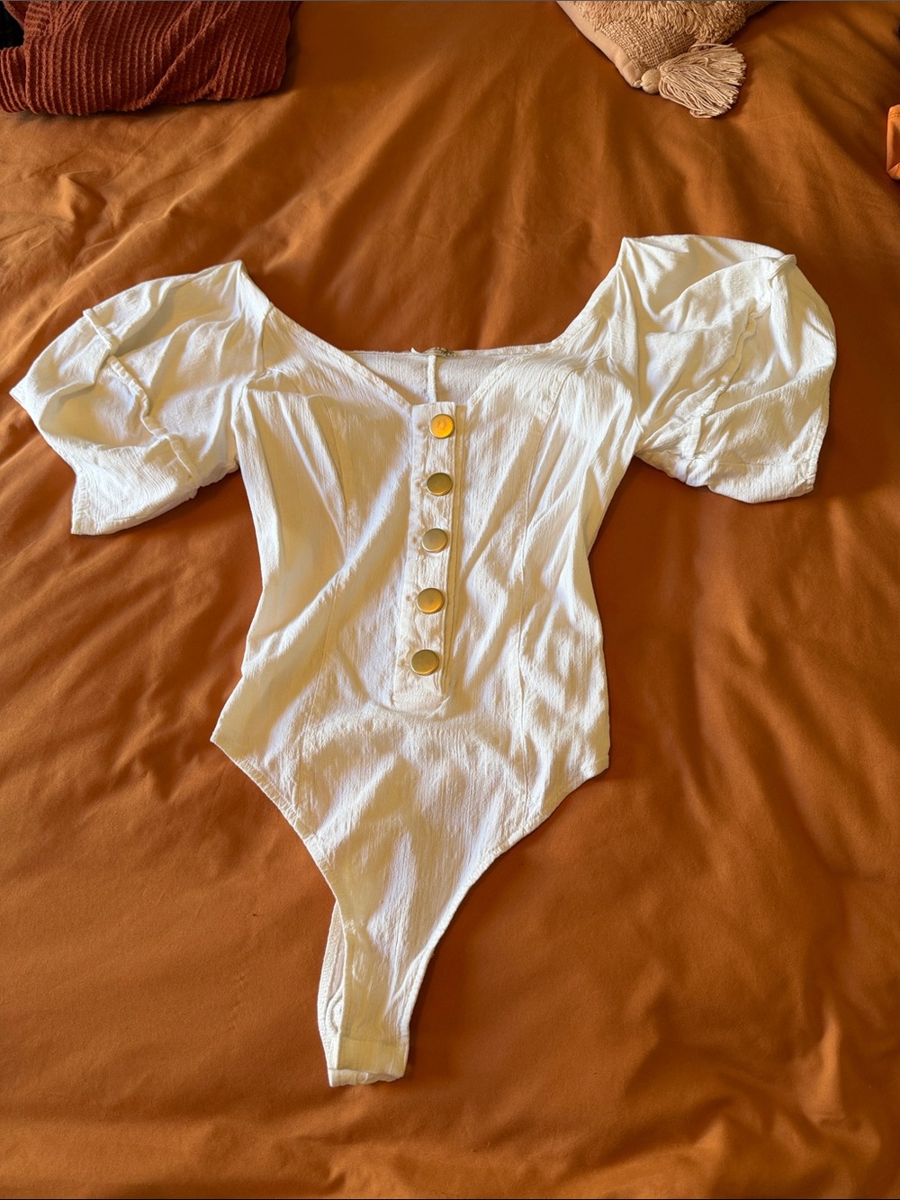White Puff-Sleeve One-Piece Bodysuit with Gold Buttons